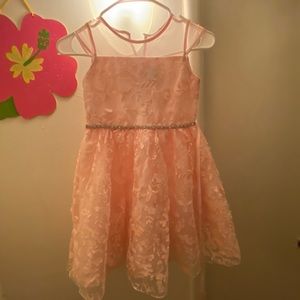 salmon-colored dress for girl in good condition for special events